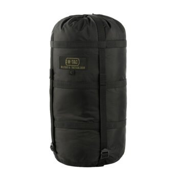 Black military compression sleeping bag made from waterproof nylon, ideal for camping, hiking, and backpacking.